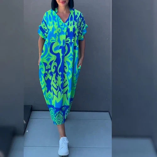 Elena™ - Elegancka sukienka w kwiaty zapewniająca romantyczny i wyrafinowany wygląd