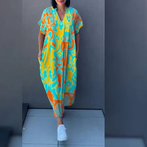 Elena™ - Elegancka sukienka w kwiaty zapewniająca romantyczny i wyrafinowany wygląd